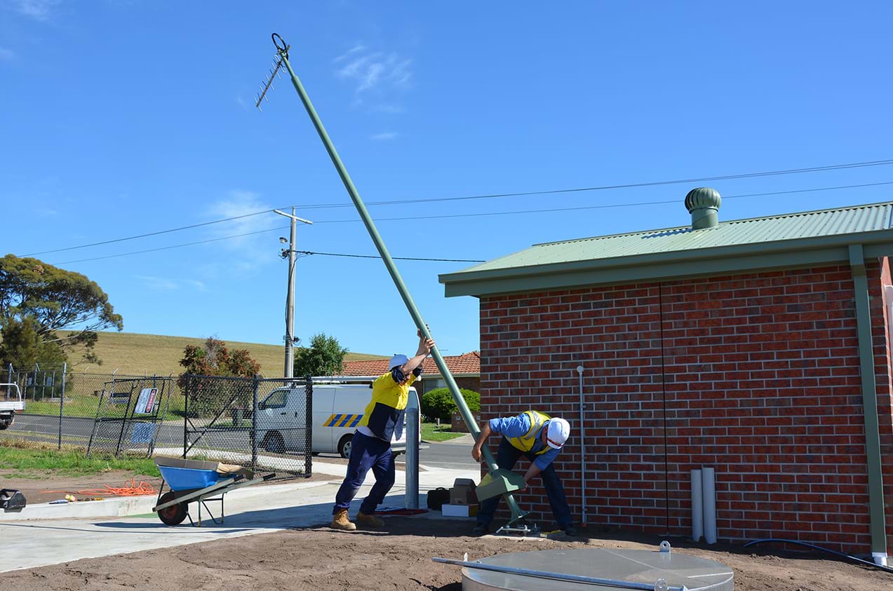 tilt down antenna pole