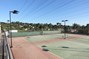Tennis court lighting poles