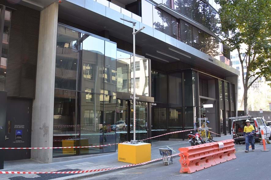 Temporary street lighting lowerable tilt pole